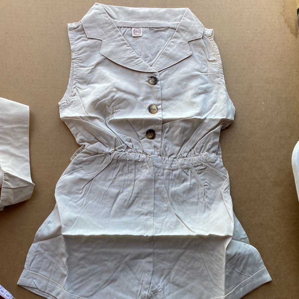 NWT Baby girl Beige sleeveless jumpsuit . Size 3/4 months